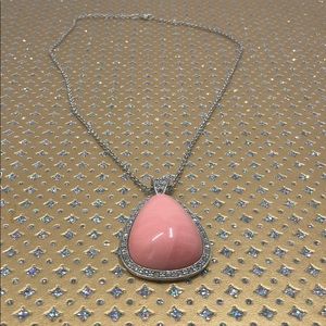 Avon Pink Necklace surrounded by rhinestones